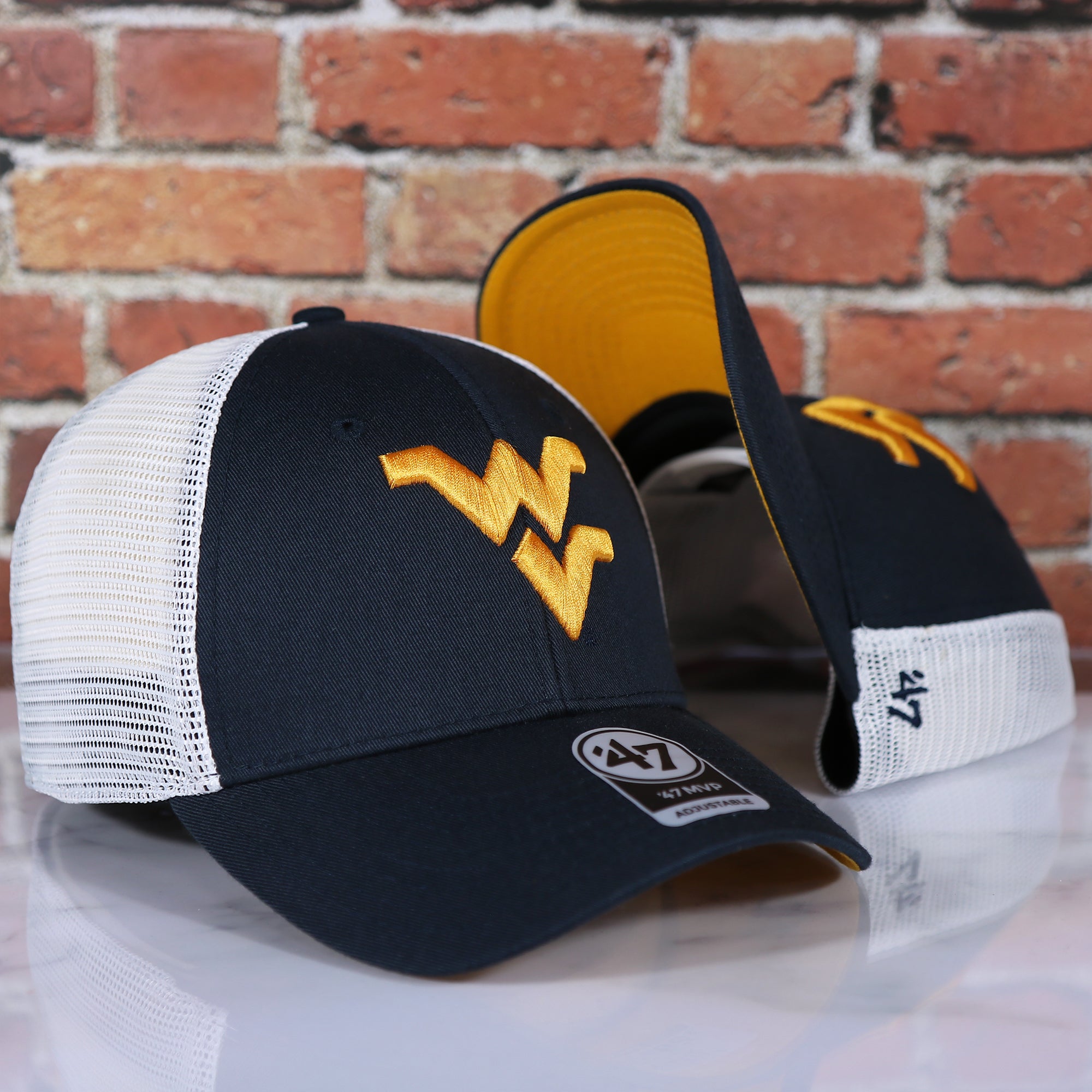 West Virginia Mountaineers MVP Yellow Bottom Trucker Cap | Navy/White | OSFM