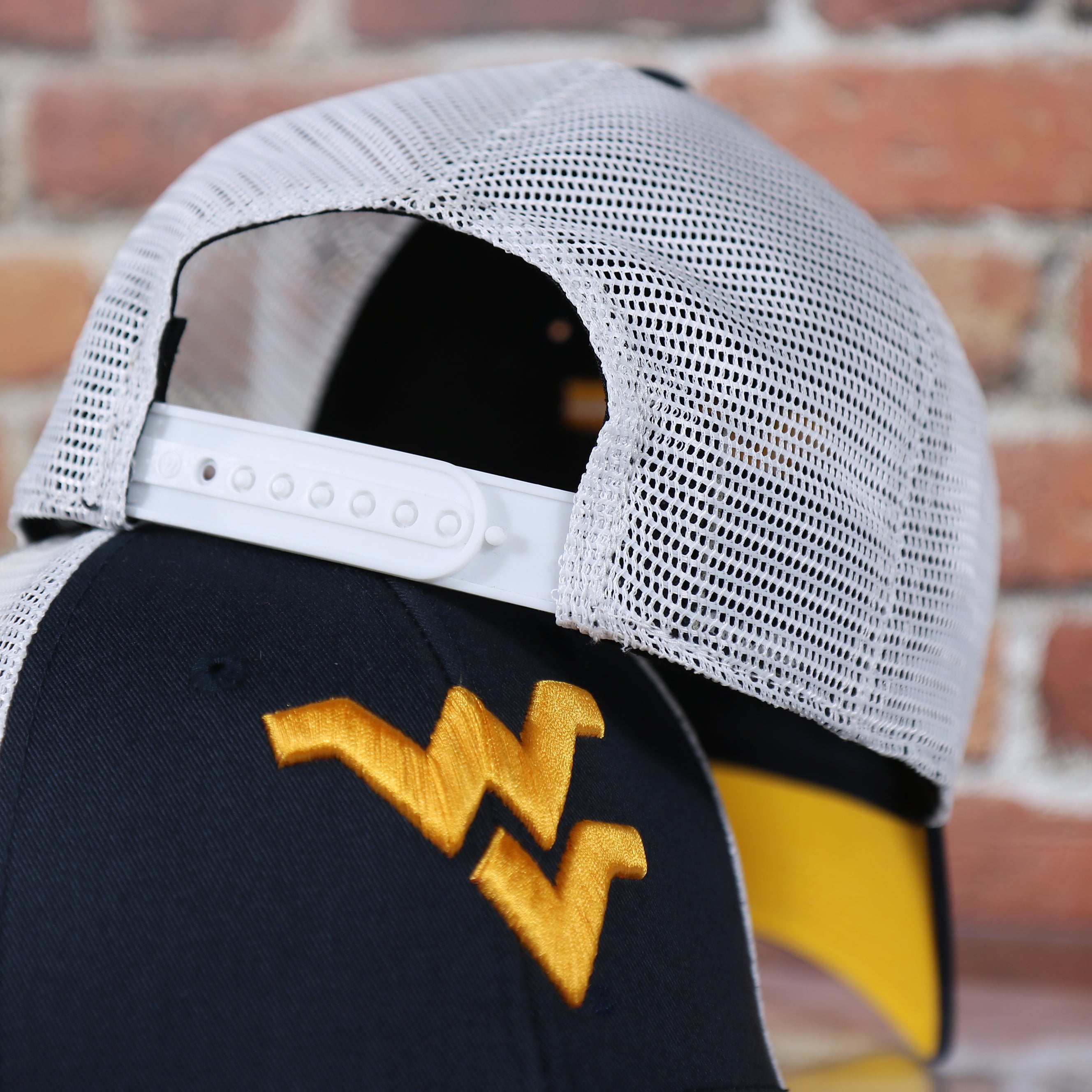 West Virginia Mountaineers MVP Yellow Bottom Trucker Cap | Navy/White | OSFM