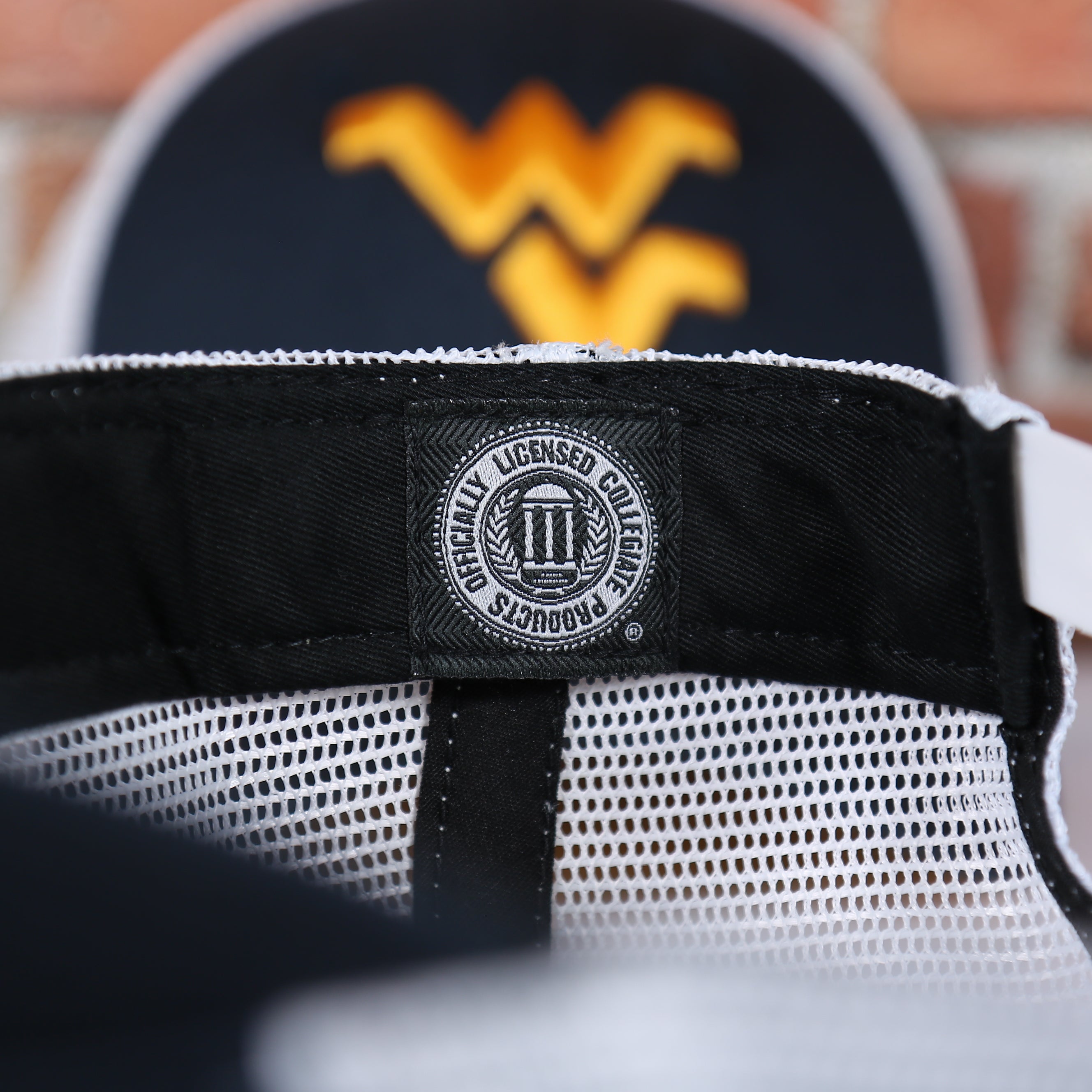 West Virginia Mountaineers MVP Yellow Bottom Trucker Cap | Navy/White | OSFM